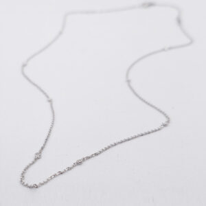 Collier or blanc 8 diamants sertis clos